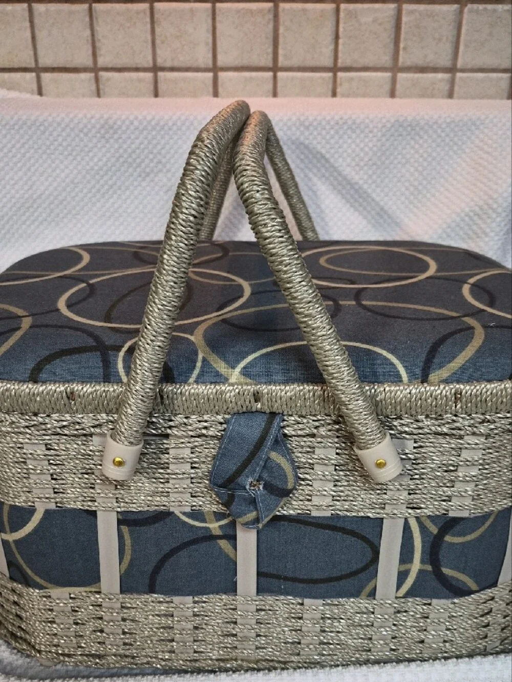 Woven Decorative Sewing Basket with Blue Pattern and Cream Trim Wooden Bottom